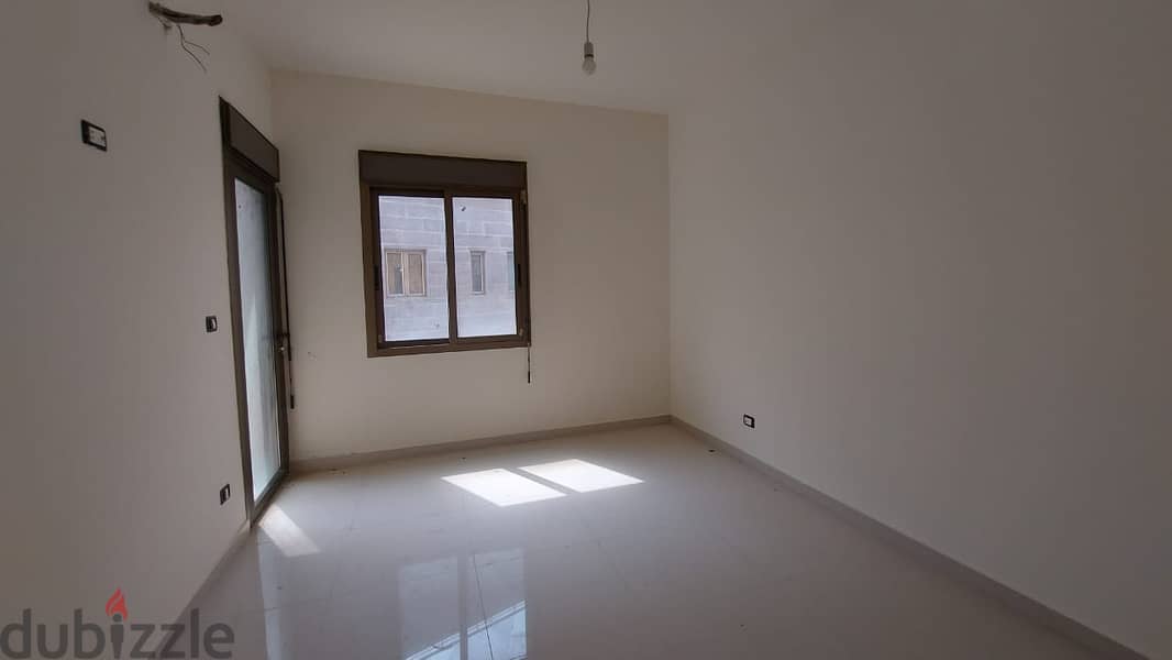 L14949-Spacious Apartment for Sale In Halat With A Beautiful View 1