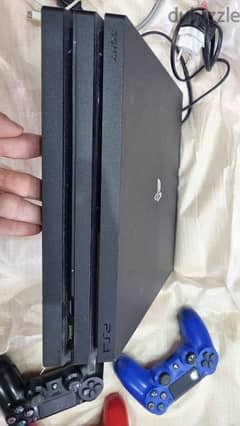 ps4 with 5 cds & 3 controllers original