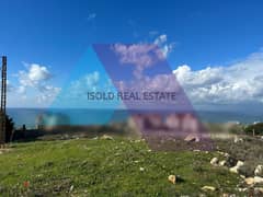 A 1315 m2 land having an open sea view for sale in Jiyeh