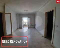 spacious apartment with potential in Achrafieh/الأشرفية REF#AS103551