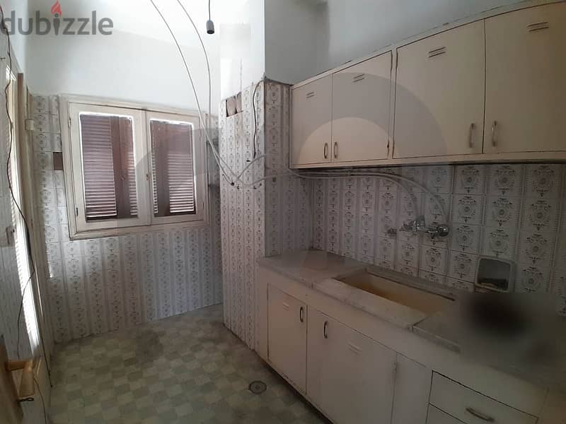spacious apartment with potential in Achrafieh/الأشرفية REF#AS103551 1