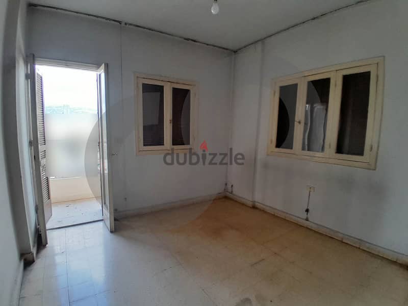 spacious apartment with potential in Achrafieh/الأشرفية REF#AS103551 4