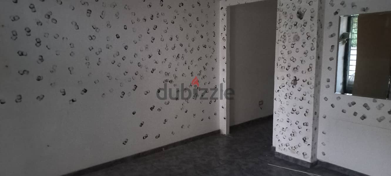 Five shops in Zalka in residential building for saleخمسة محلات تجارية 5