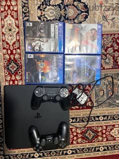 PS4 slim 1T 2 controllers and 4 free games