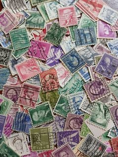 dozens of old US stamps