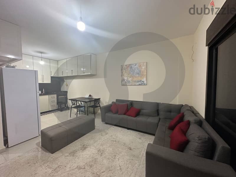 Cozy apartment for sale in Batroun/بترون REF#RI103751 1