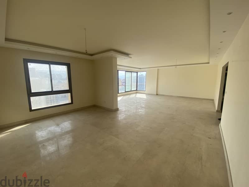 Heart of Beirut: Prime Tower Apartment for Sale 3
