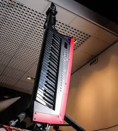Roland AX Edge 49 Key Keytar Synthesizer keyboard (Black) piano