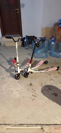 2 scooters and 2 extra tires