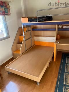 Two beds + working space + stair storage 0