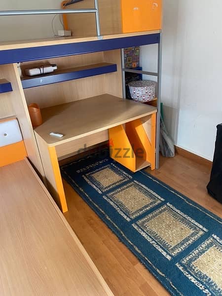 Two beds + working space + stair storage 2