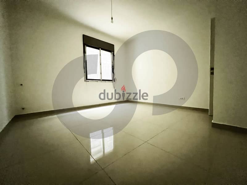 Apartment with a Terrace for Sale in Ballouneh!بلونة! REF#CM00868 2