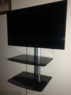 Used like new, with the table for 100$ not smart TV 32 inch