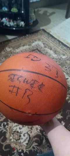basketball singed by coach and players of sagess