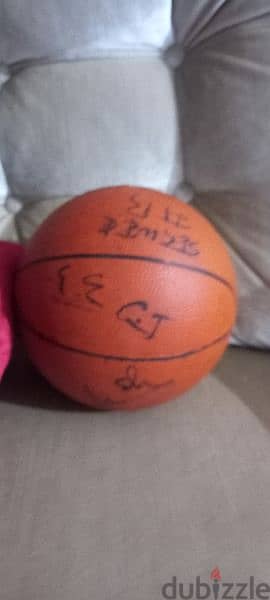 basketball singed by coach and players of sagess 2