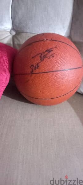 basketball singed by coach and players of sagess 3