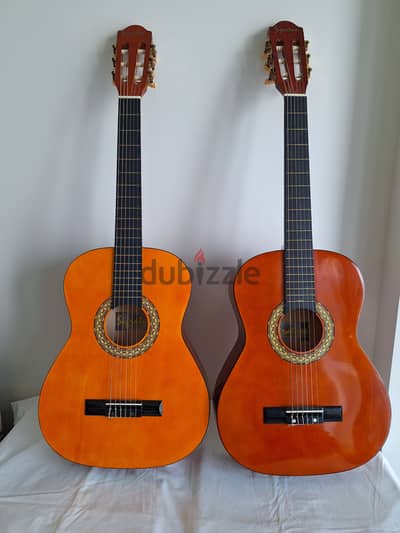 Two PREMIUM (brand)  small body Classical Guitars and 2guitar stands