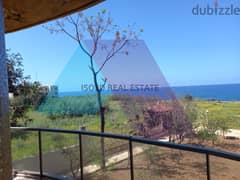 A 600 m2 Triplex Villa having an open sea view for sale in Jiyeh 0