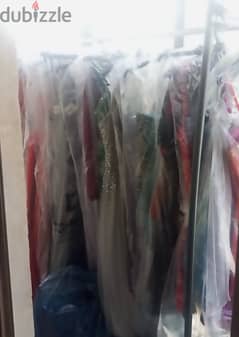 huge dress quantity for sale in bulk. كمية فساتين كبيرة للبيع 0