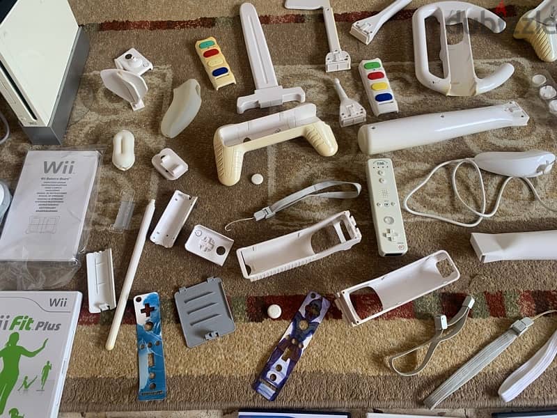 wii console+wii fit plus like new+many accessories more 18game 120$all 1