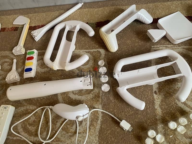 wii console+wii fit plus like new+many accessories more 18game 120$all 7