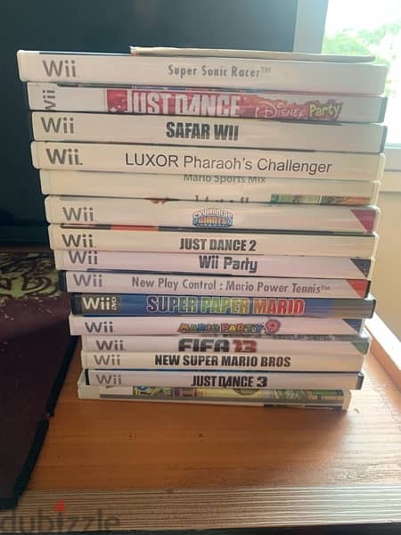 wii console+wii fit plus like new+many accessories more 18game 120$all 8