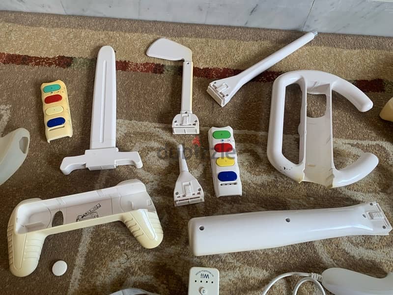 wii console+wii fit plus like new+many accessories more 18game 120$all 11