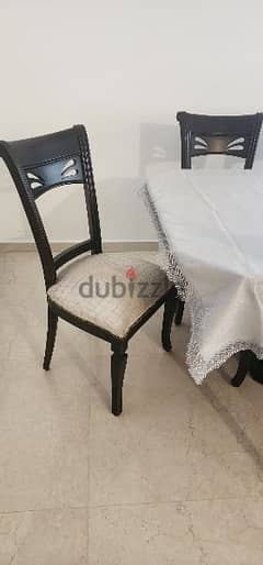 Dining table and 8 chairs 0