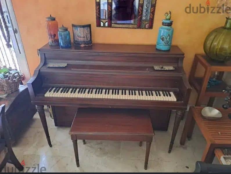 " Cable" piano with its bench 0