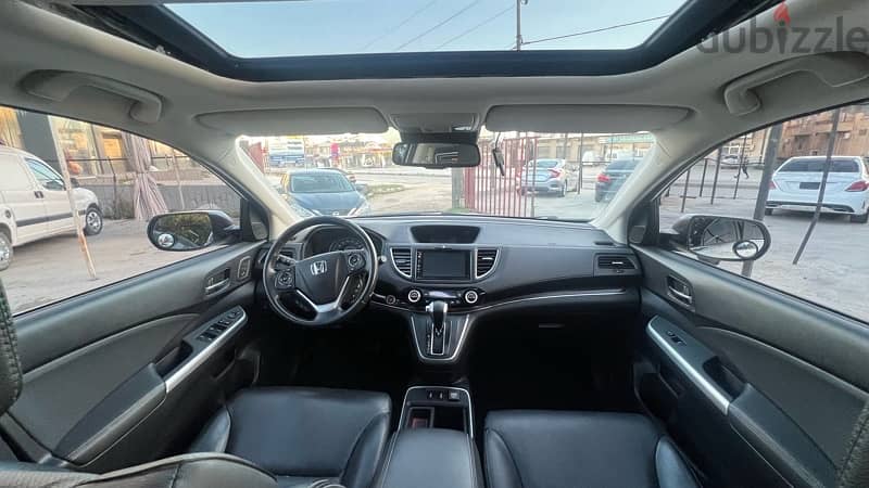 honda crv touring AWD 2015 super clean and law milege 10