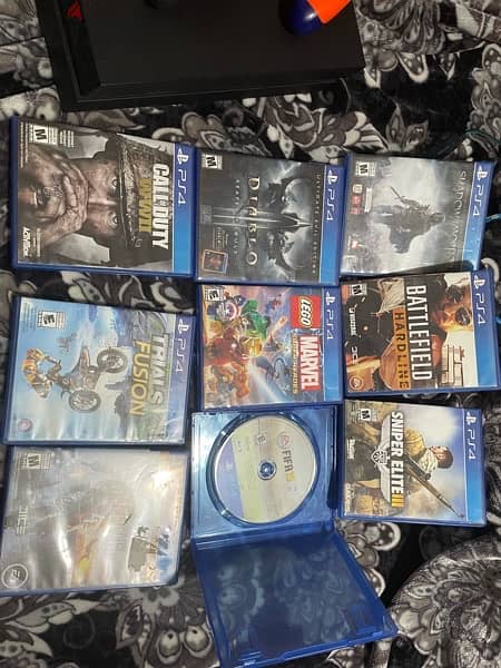 ps4 playstation 4  with 8cds and two controllers and free headset 1