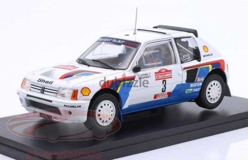 Peugeot 205 T16 (Rally Sanremo 1984) diecast car model 1:24. . 1