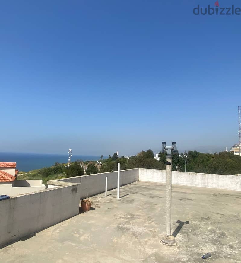 L15018-Apartment With Roof & A Beautiful Seaview for Sale In Dbayeh 1