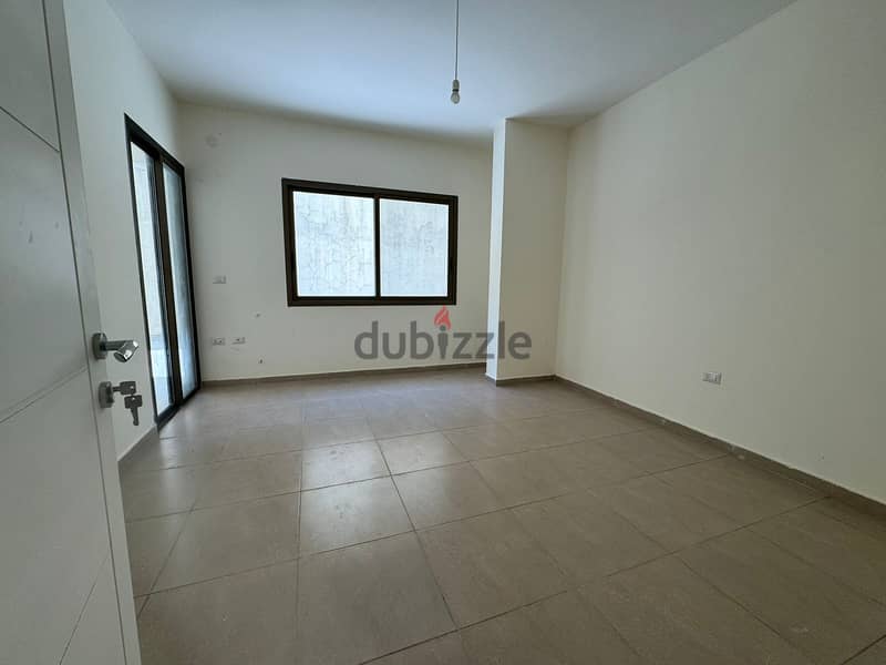L15021-Spacious Apartment With Terrace for Sale In Louaize 1