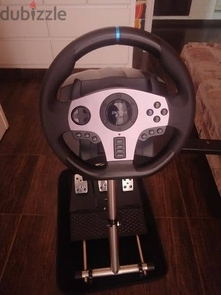 PXN steering wheel with pedals and stand and 2 cds 1