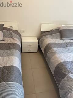 2 Beds + 2 Matresses +  1 small movable table for Sale