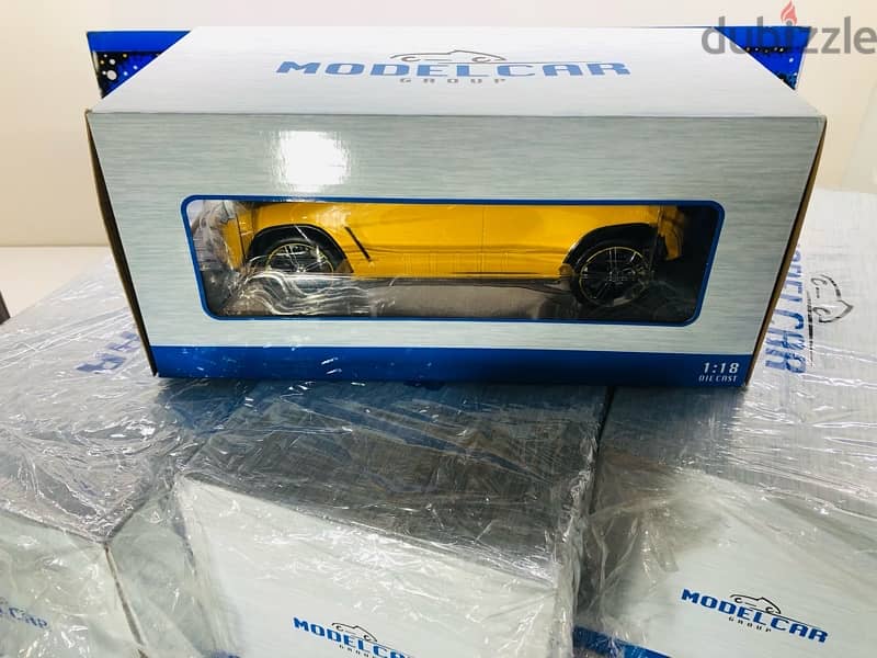 1/18 diecast Lamborghini Urus Mettalic Yellow NEW IN BOX. By Modelcar 1