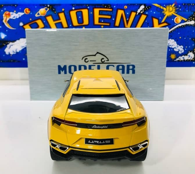 1/18 diecast Lamborghini Urus Mettalic Yellow NEW IN BOX. By Modelcar 2