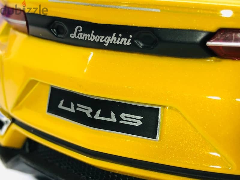 1/18 diecast Lamborghini Urus Mettalic Yellow NEW IN BOX. By Modelcar 7