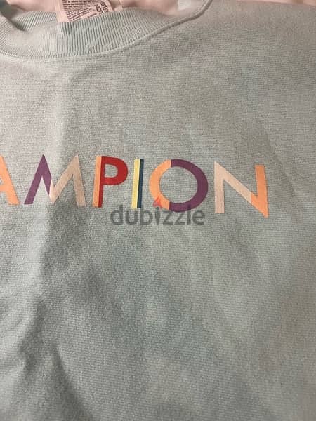 Champion turquoise cropped hoodie 1