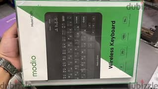 The Modio tablet pc 1099V 4G 4/64gb 10 inch with wireless keyboard plu