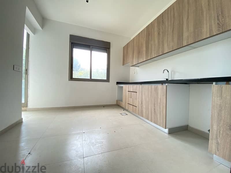 A 3 bedroom apartment with garden for rent in Awkar 3