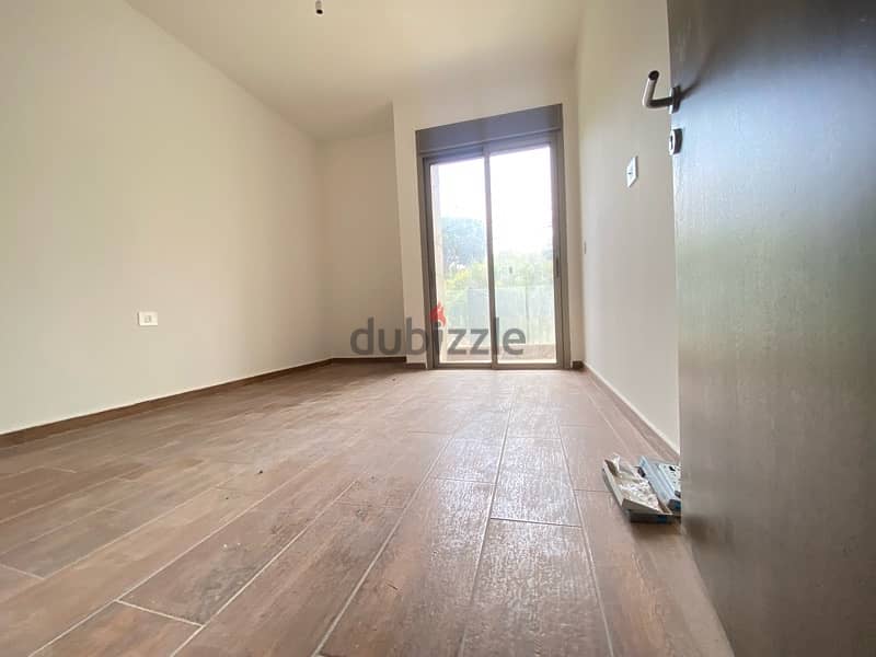 A 3 bedroom apartment with garden for rent in Awkar 5