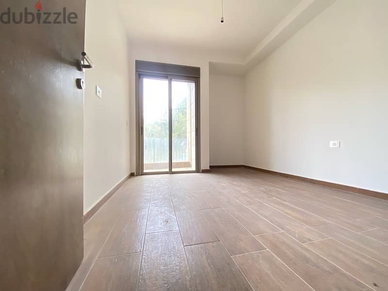 A 3 bedroom apartment with garden for rent in Awkar 6