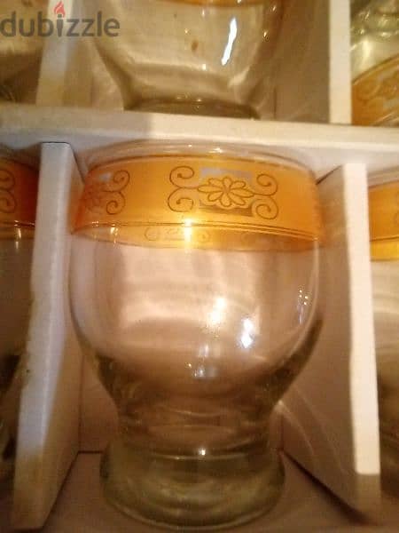 دزينة اكواب زجاج شفاف فاخرة مطلية ذهبي بالعلبة ٦+ثاني علبة بلا غطاء=30 1