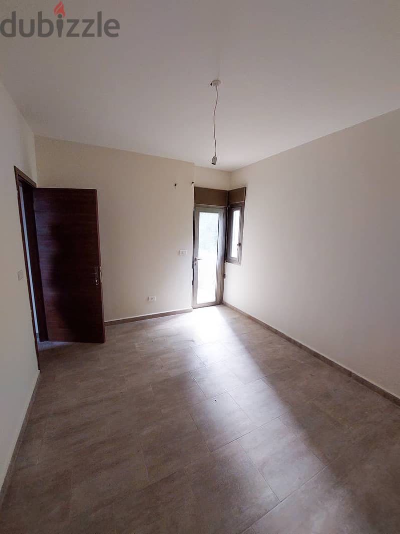 105 SQM New Apartment in Zikrit with Sea and Mountain View 4