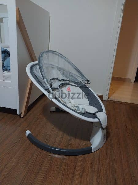 baby swing like new, electric comes with remonte control for music 1