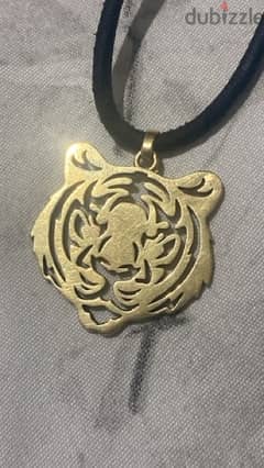 18k gold Tiger pendant. 0