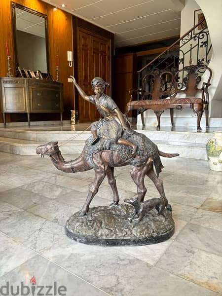large bronze statue, arab hunter riding a camel 1