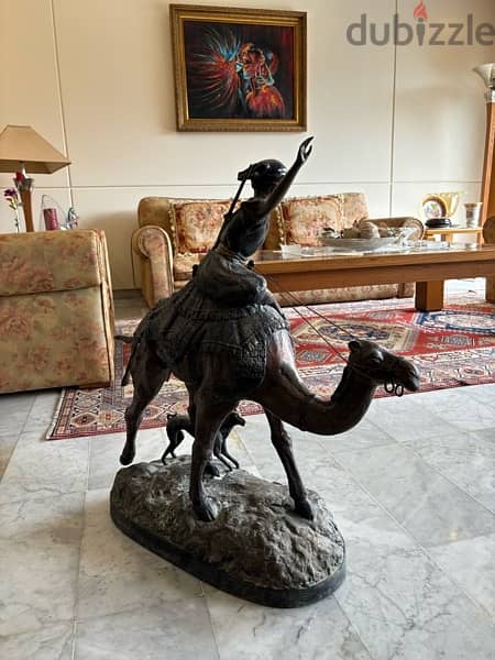 large bronze statue, arab hunter riding a camel 2